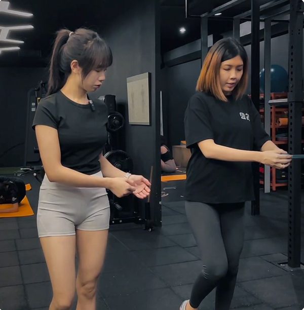 Carol coaching a member in the studio