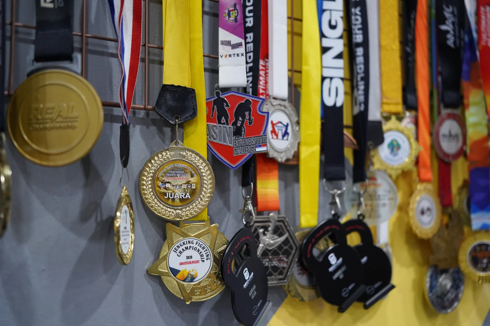 Competition medals won by Fitcom Muay Thai members and coaches