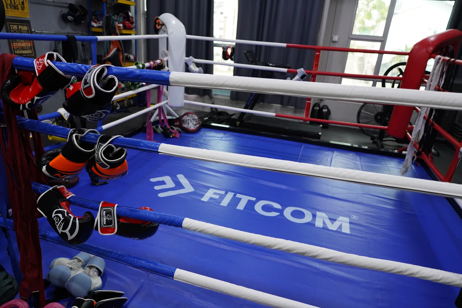 The ring and training gear at the Fitcom Muay Thai gym, Melaka